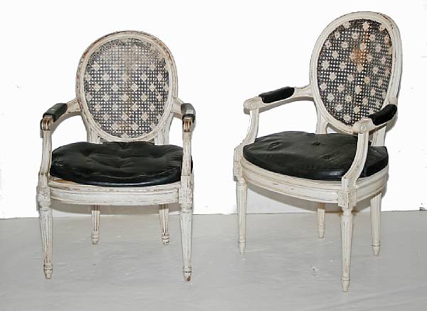 Appraisal: A set of eight Louis XVI style painted fauteuils en