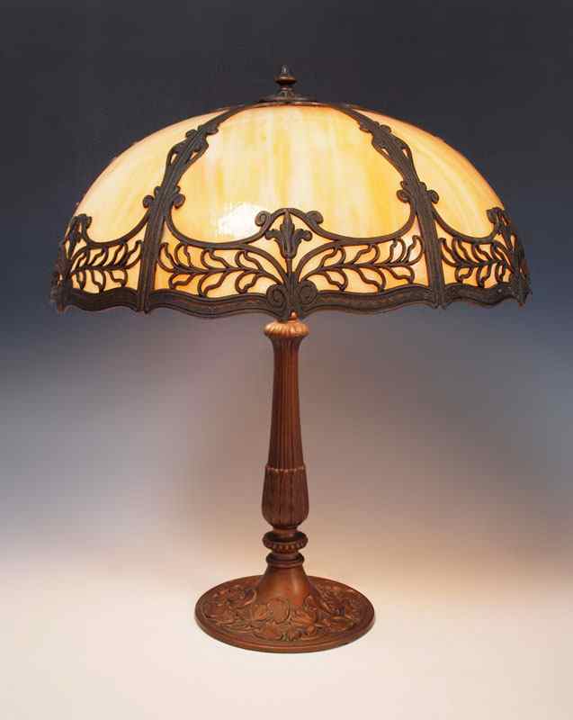 Appraisal: VINTAGE SLAG GLASS TABLE LAMP Dome shade of panels caramel