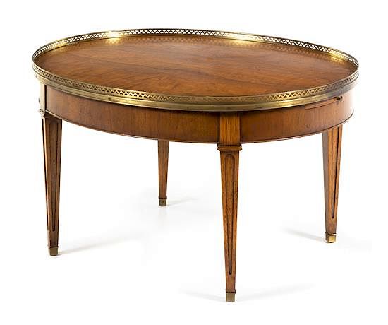 Appraisal: A Louis XVI Style Mahogany Low Table Height x width