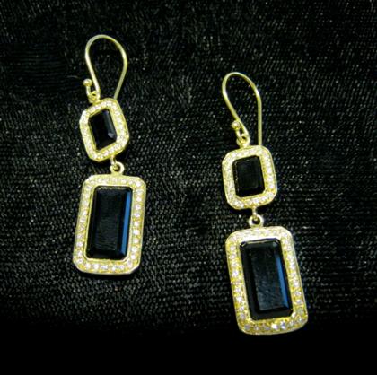 Appraisal: karat yellow gold diamond and onyx earrings IppolitaOnyx pieces framed