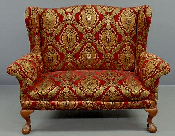 Appraisal: Chippendale style mahogany upholstered settee h x w x d