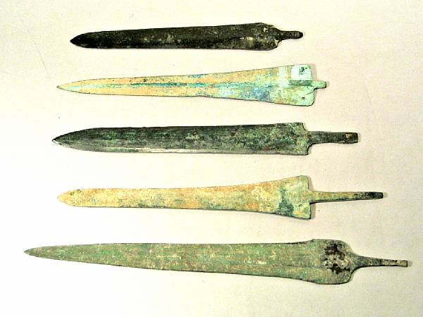 Appraisal: A lot of five Bronze Age dagger blades Comprising inch