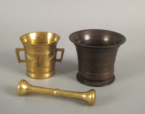 Appraisal: Two brass mortars and a pestle ca and h