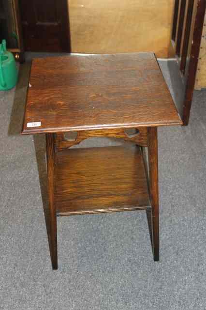 Appraisal: AN ARTS AND CRAFTS OAK SQUARE OCCASIONAL TABLE across