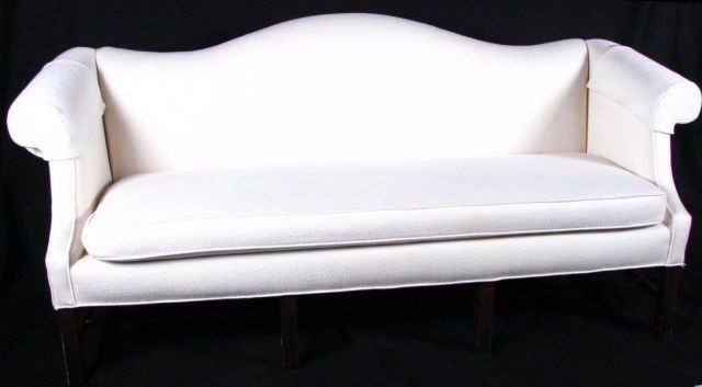 Appraisal: Chippendale style contemporary sofa with off white upholstery and single