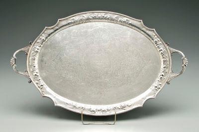 Appraisal: English silver tray oval with two scroll handles scalloped border