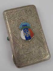 Appraisal: A Russian silver cheroot case with cabochon release bright engraved