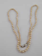 Appraisal: A graduated natural pearl necklace with Gem Pearl laboratory report