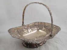 Appraisal: A Georgian silver swing handled cake basket of shaped rectangular