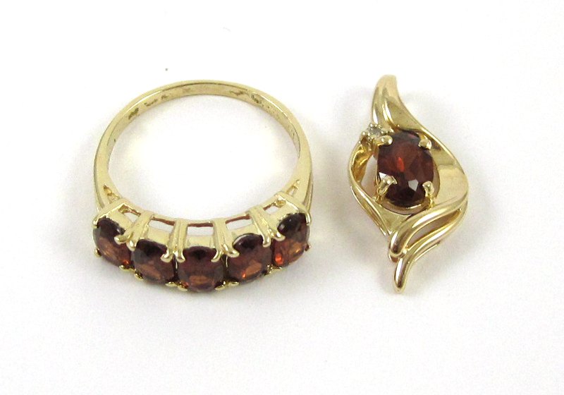 Appraisal: TWO ARTICLES OF GARNET JEWELRY including a k yellow gold