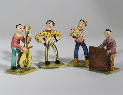 Appraisal: An Italian pottery four piece band comprising piano player cello