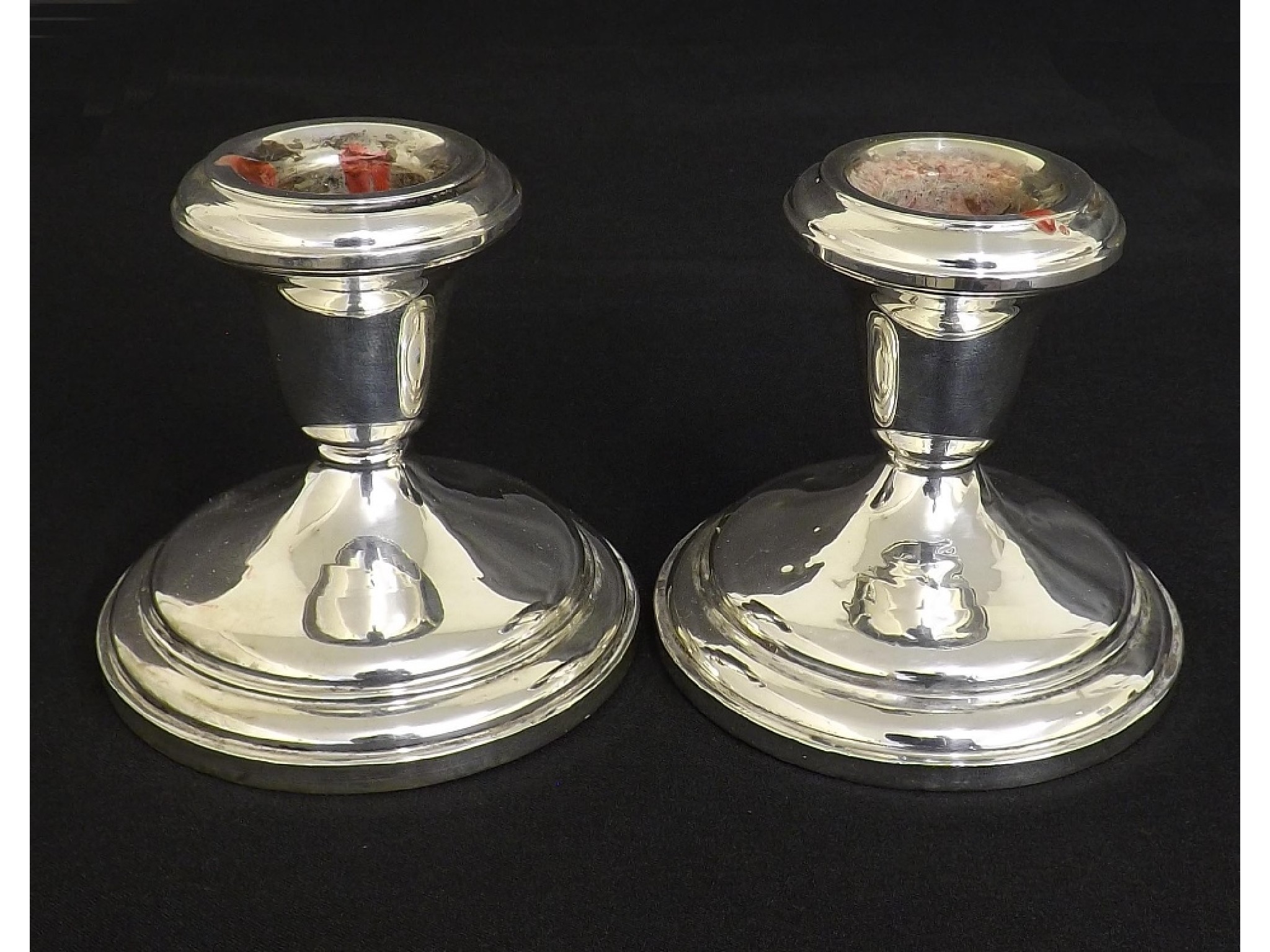 Appraisal: Pair of sterling silver weighted dwarf candlesticks high