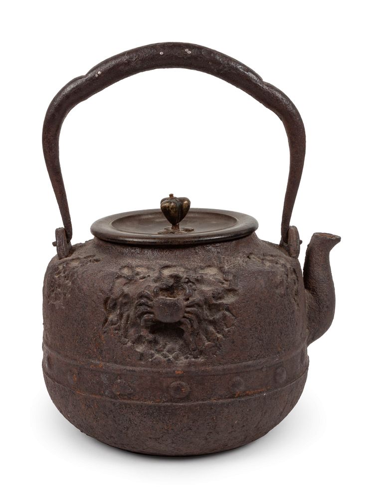 Appraisal: A Tetsubin A Tetsubin cast in iron the exterior decorated