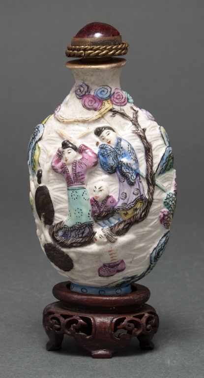 Appraisal: Chinese molded and painted porcelain snuff bottle th century molded