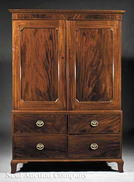 Appraisal: An Antique Georgian-Style Mahogany Linen Press molded cornice above paneled