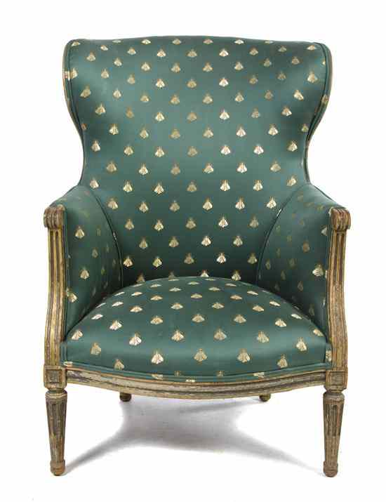 Appraisal: A Louis XVI Style Wingback Armchair having back arms and