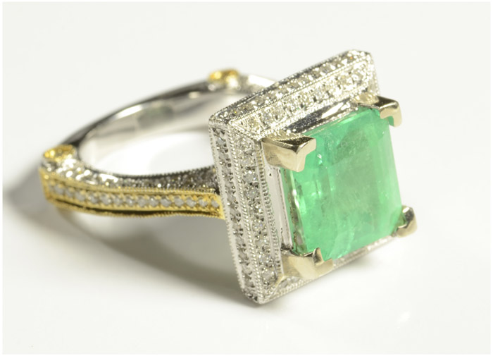 Appraisal: EMERALD DIAMOND AND FOURTEEN KARAT GOLD RING The white and