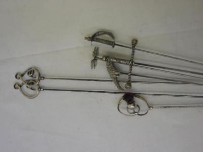 Appraisal: A PAIR OF SILVER CHARLES HORNER HAT PINS modelled as