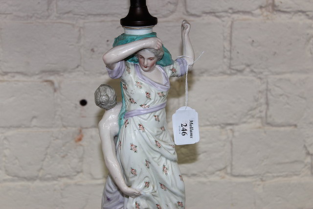 Appraisal: A CONTINENTAL PORCELAIN CENTREPIECE in the form of dancing girls