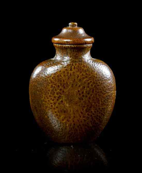 Appraisal: A Carved Bamboo Snuff Bottle of compressed baluster form having