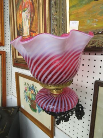 Appraisal: Cranberry Opalescent Art Glass Oil Lamp metal wall bracket swirl