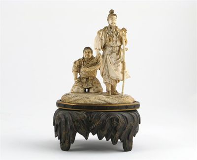 Appraisal: A good Japanese ivory carving of two warriors one standing