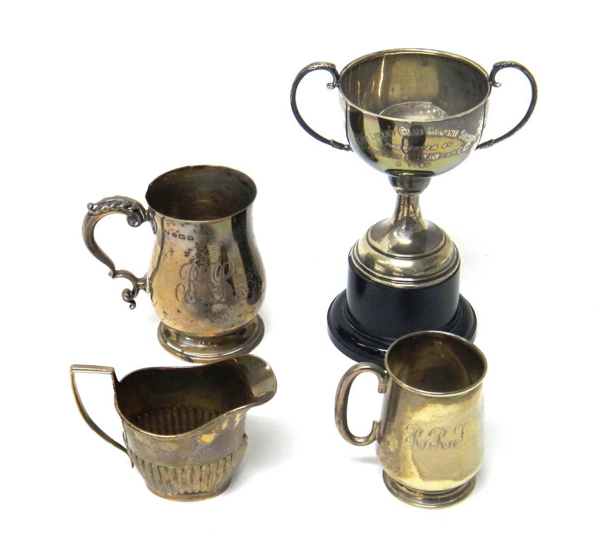 Appraisal: Silver comprising a baluster shaped christening mug having a scrolling