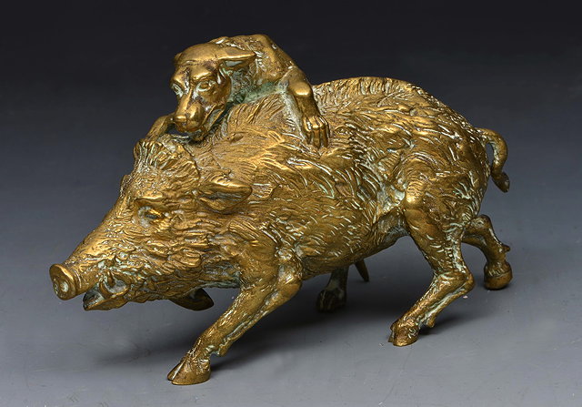 Appraisal: A GILT BRONZE AFTER THE ANTIQUE a hound attacking a