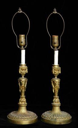 Appraisal: PAIR OF LOUIS XVI-STYLE GILT-METAL CANDLESTICK LAMPS Each tapered satyr