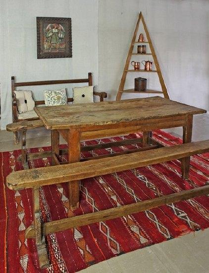 Appraisal: A Spanish pine kitchen table with two-plank top on square