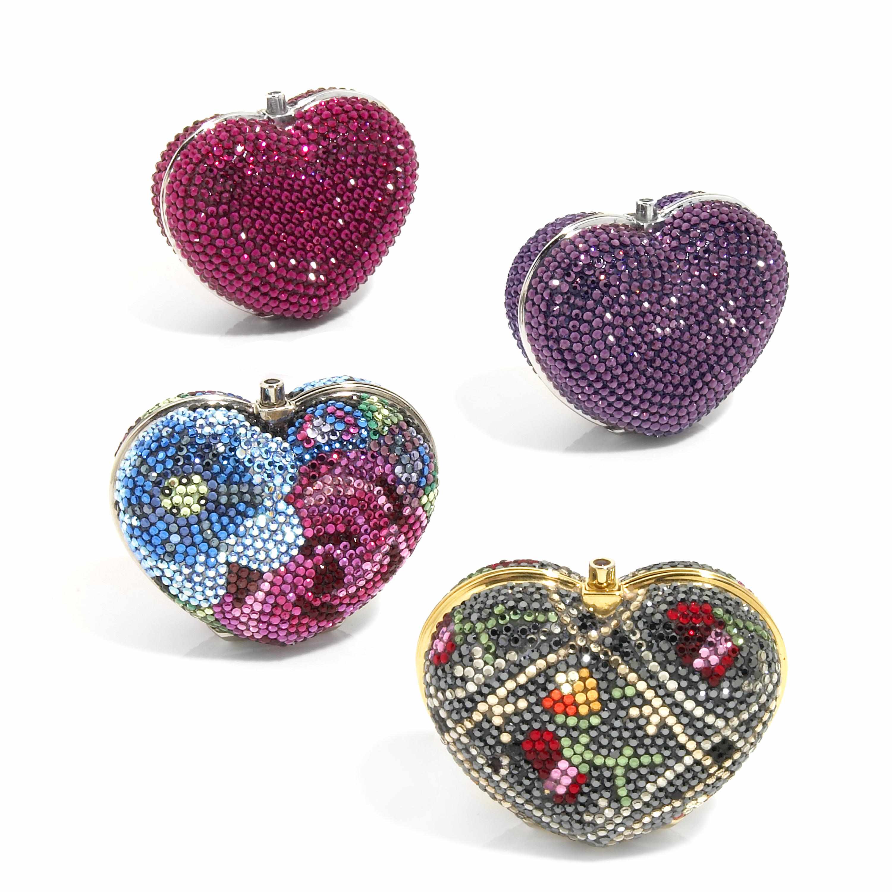 Appraisal: A collection of heart-shaped pillboxes all signed Judith Leiber accompanied