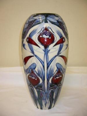 Appraisal: A WALTER MOORCROFT POTTERY VASE of flared rounded cylindrical form