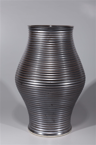 Appraisal: Unusual Chinese glazed porcelain vase with molded concentric circles throughout