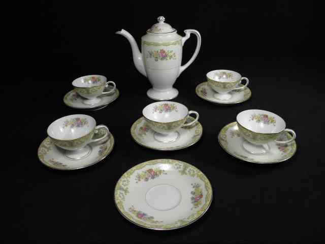 Appraisal: Noritake Japanese porcelain partial demitasse tea set Cream and white