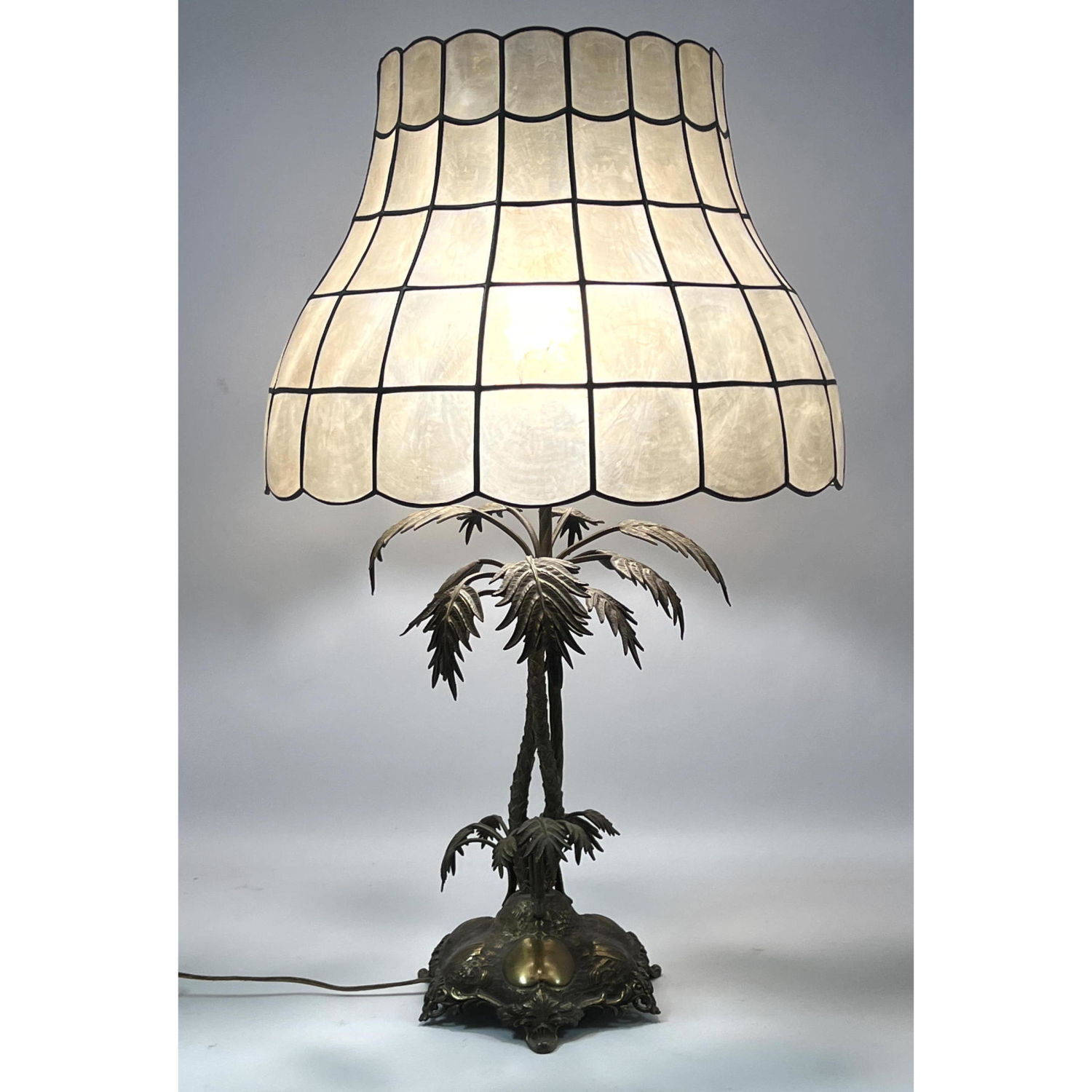 Appraisal: Figural Palm Tree Table Lamp Capiz Shell Shade Base is