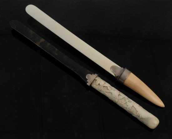 Appraisal: Two Victorian tortoiseshell bone and ivory letter openers Comprising one