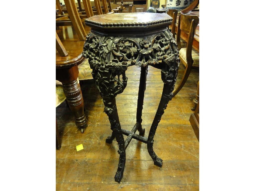 Appraisal: A Chinese rosewood jardiniere stand the octagonal top with inset