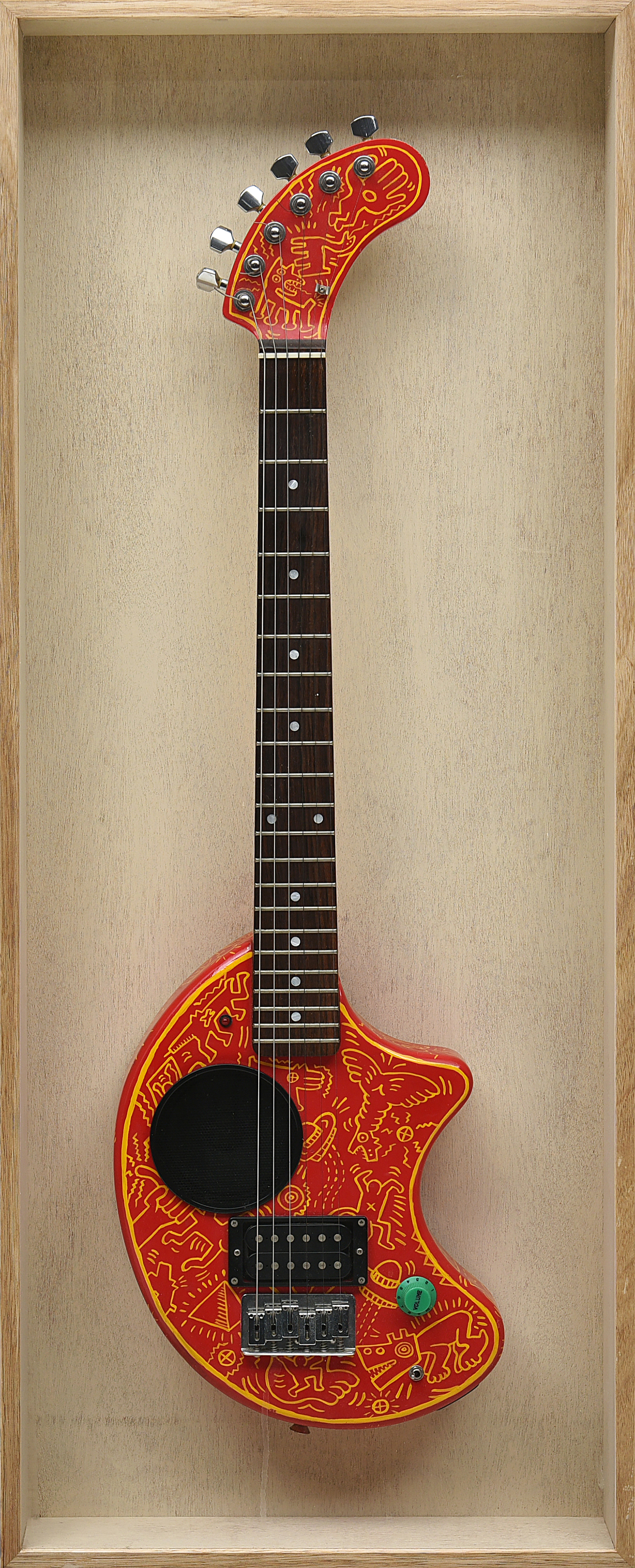 Appraisal: A FRAMED GUITAR WITH HAND PAINTED KEITH HARING DESIGN x