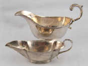 Appraisal: A silver sauceboat on spread foot with gadrooned rim and