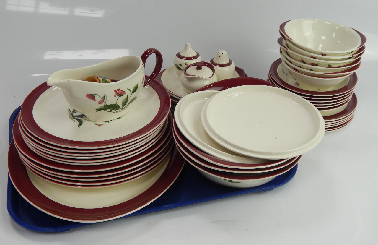 Appraisal: A Wedgwood part dinner and breakfast service decorated with poppy