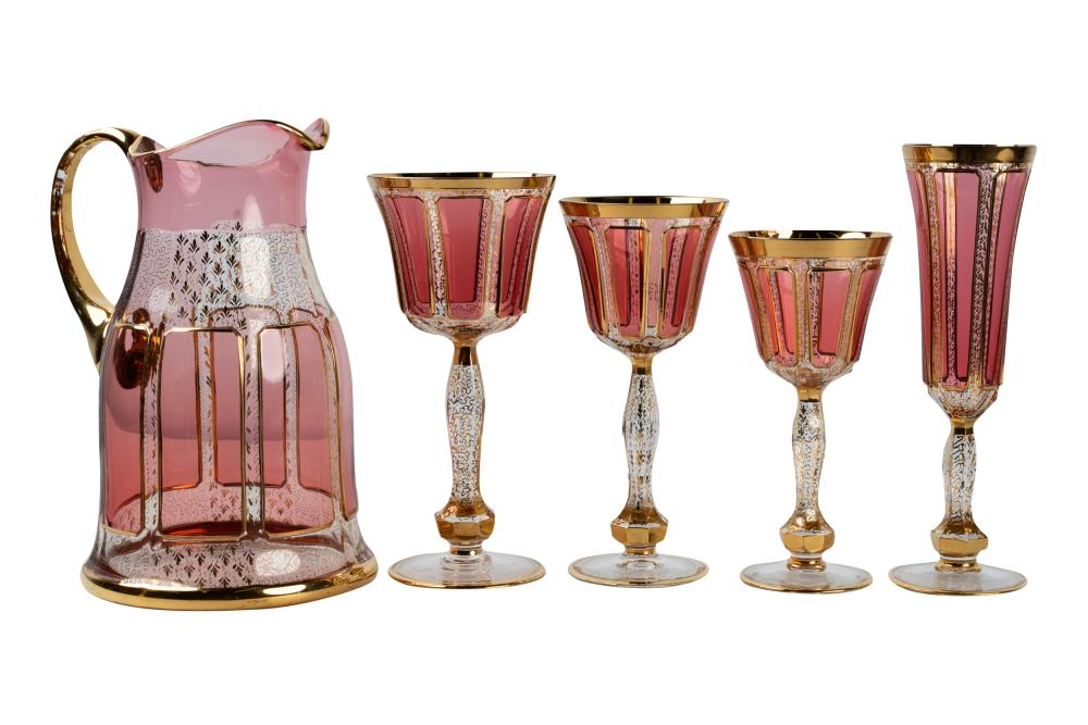 Appraisal: MOSER GILT GLASS DRINK SETcomprising water goblets inches high champagne