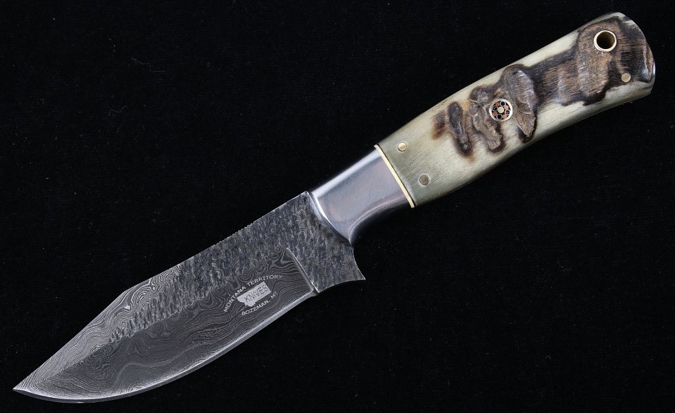 Appraisal: M T Knives Rams Horn Damascus Hammered Knife This is