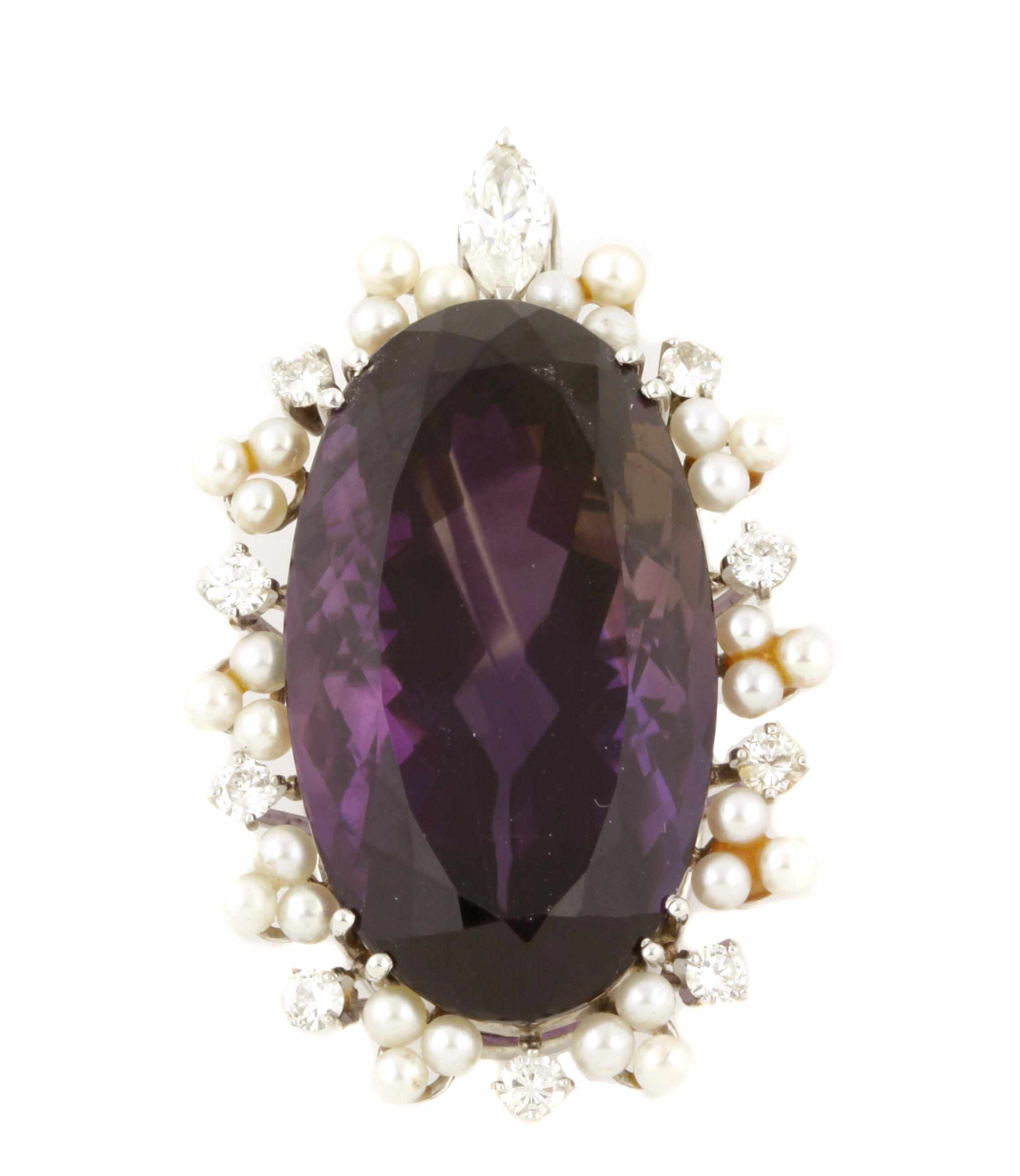 Appraisal: An amethyst seed pearl diamond and k white gold pendant