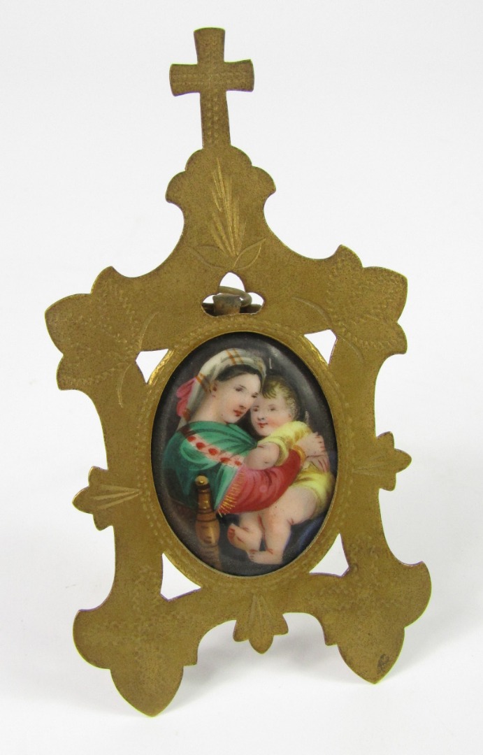 Appraisal: After Raphael A porcelain plaque painted with the Madonna and