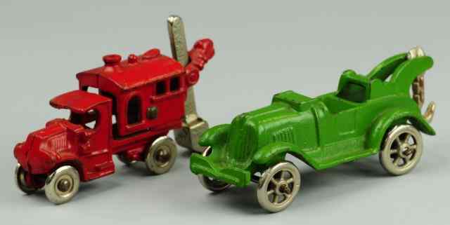 Appraisal: HUBLEY WRECKER AND SHOVEL TRUCK Small cast iron vehicles includes