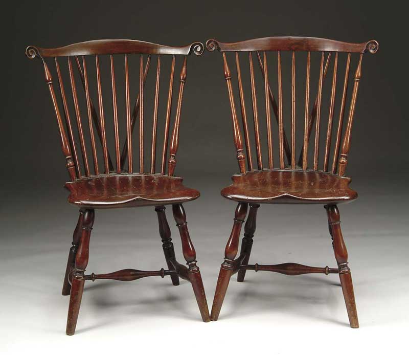 Appraisal: PAIR OF BRACE-BACK WINDSOR FAN-BACK SIDE CHAIRS Nine spindle back