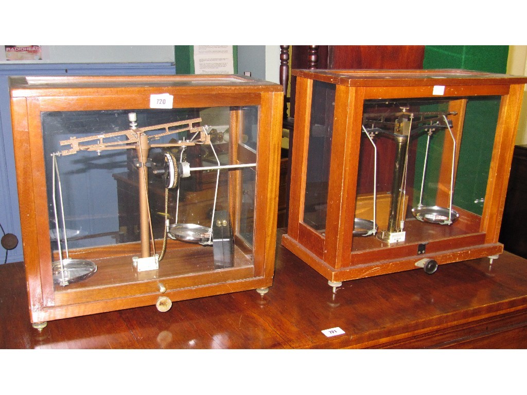 Appraisal: Lot comprising two cased beam balance scales