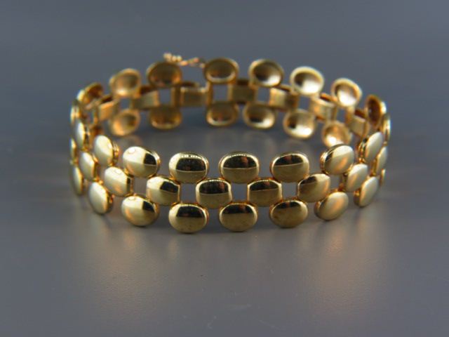 Appraisal: k Gold Bracelet oval designs in three rows yellow gold