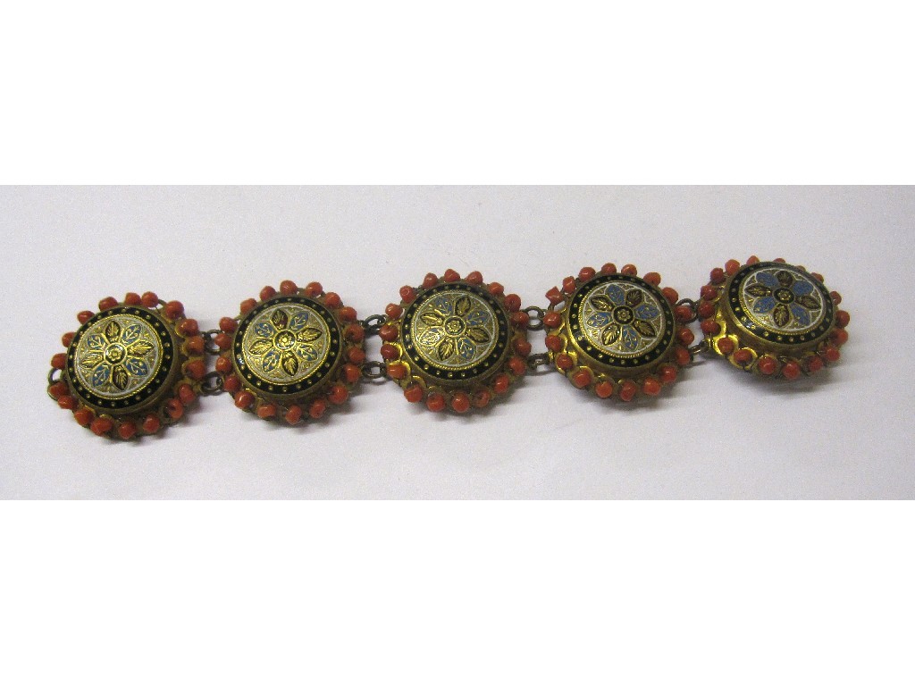 Appraisal: Gilt metal circular plaque bracelet with enamelled centre and coral