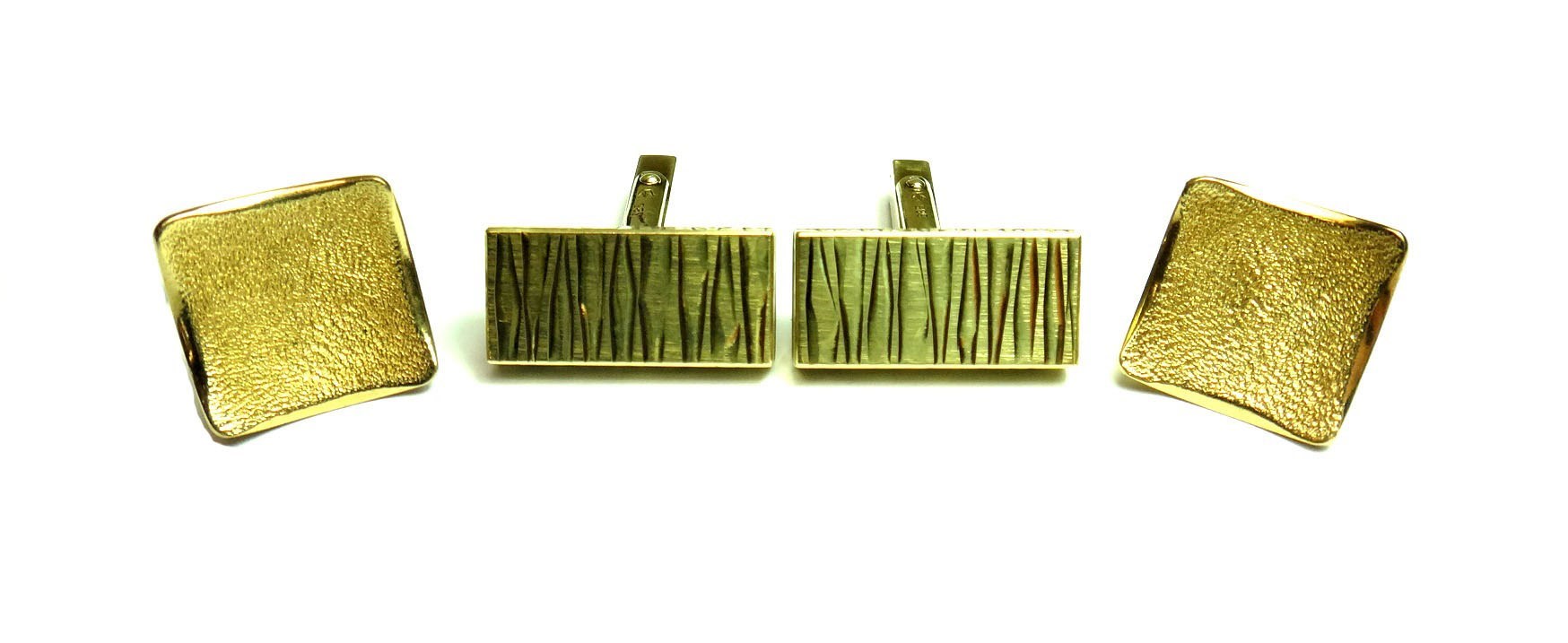 Appraisal: A pair of gold cufflinks with rectangular fronts having a